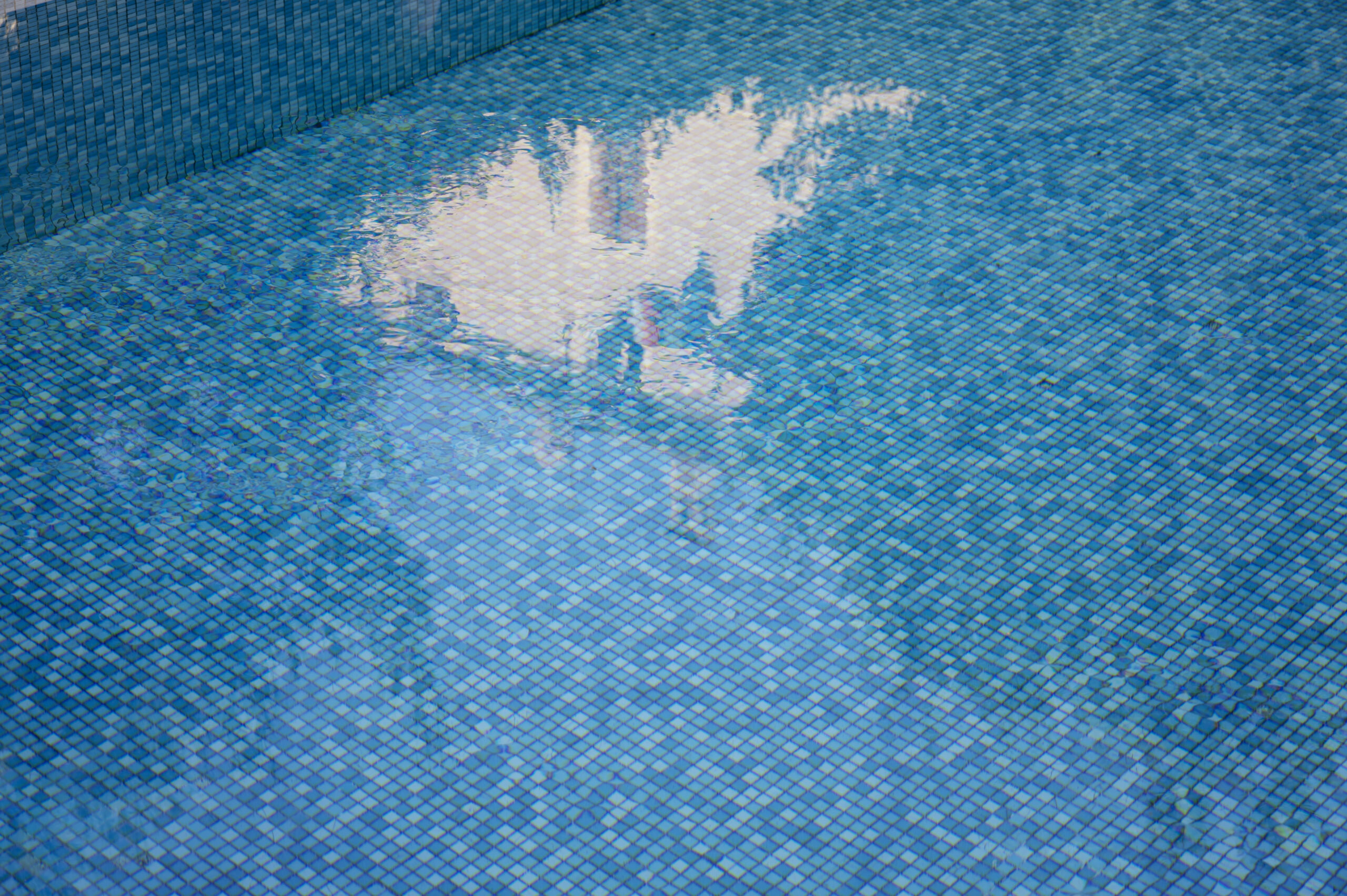 Swimming pool with blue water. Summer relax concept
